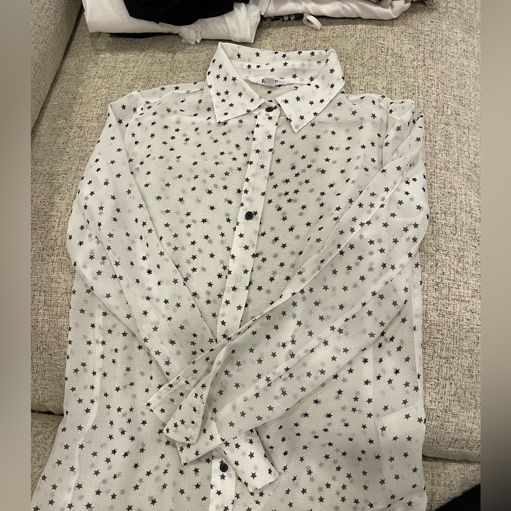 BB Dakota white sheer shirt with black stars. Size small